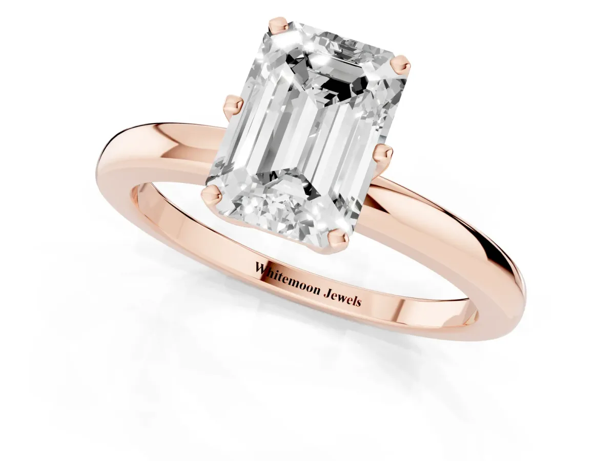 Emerald Cut Solitaire Diamond Ring with Six-Prong Setting on a Classic Band Rose gold