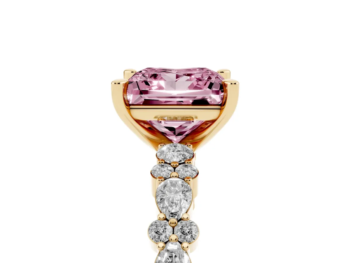 Fancy Pink Princess Cut Diamond Side Stone Solitaire Ring with Round and Four-Prong Setting Yellow gold