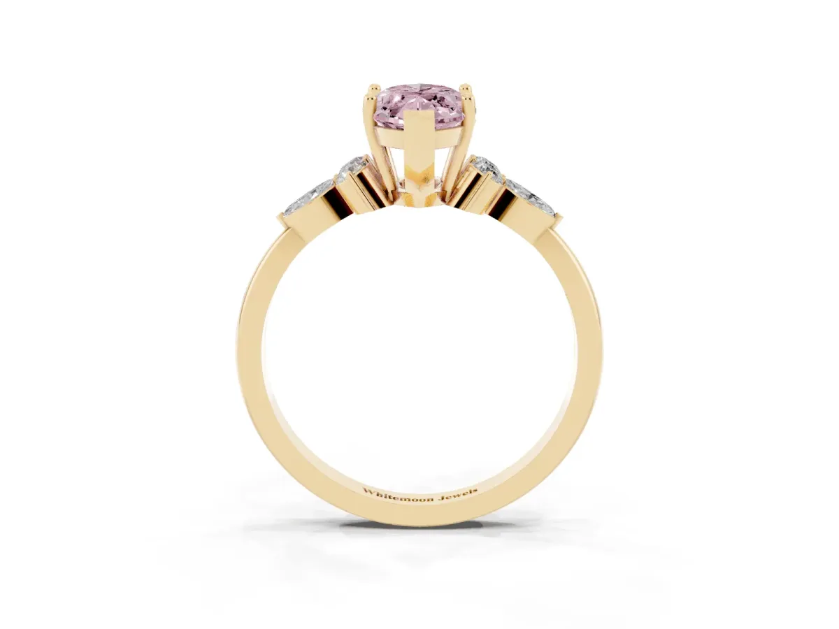 Fancy Pink Marquise Cut Brilliant Diamond Solitaire Ring with Pear Side Stones and Four-Prong Setting Yellow gold