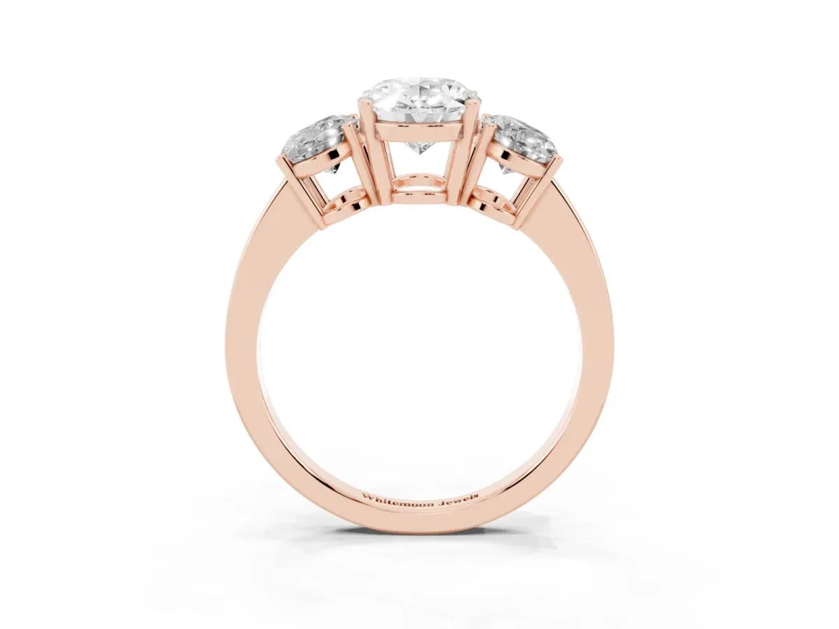 Three-Stone Oval Cut Cut Diamond Engagement Ring with Flat Band and Four-Prong Setting Rose gold