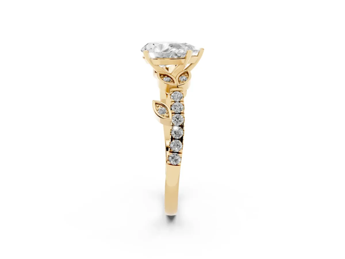 Pear Cut Solitaire Leaf-Inspired Diamond Ring with Pavé Band and Four-Prong Setting Yellow gold
