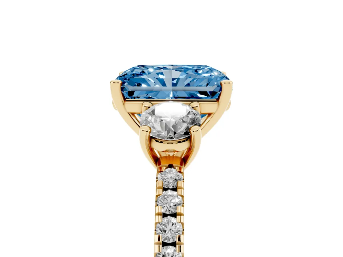 Fancy Blue Three-Stone Radiant Cut Cut Diamond Pavé Band with Prong Setting Yellow gold