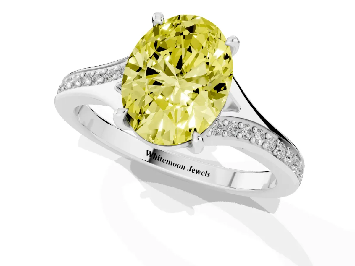 Fancy Yellow Oval Cut Diamond Solitaire Ring with Pavé Band and Prong Setting Silver