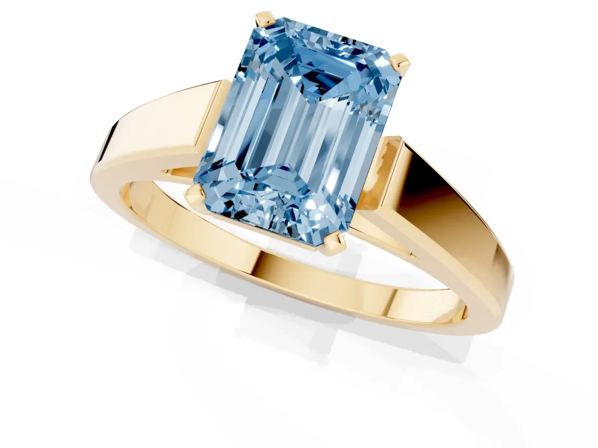 Fancy Blue Emerald Cut Solitaire Engagement Ring with Four-Prong Setting and Tapered Band Yellow gold