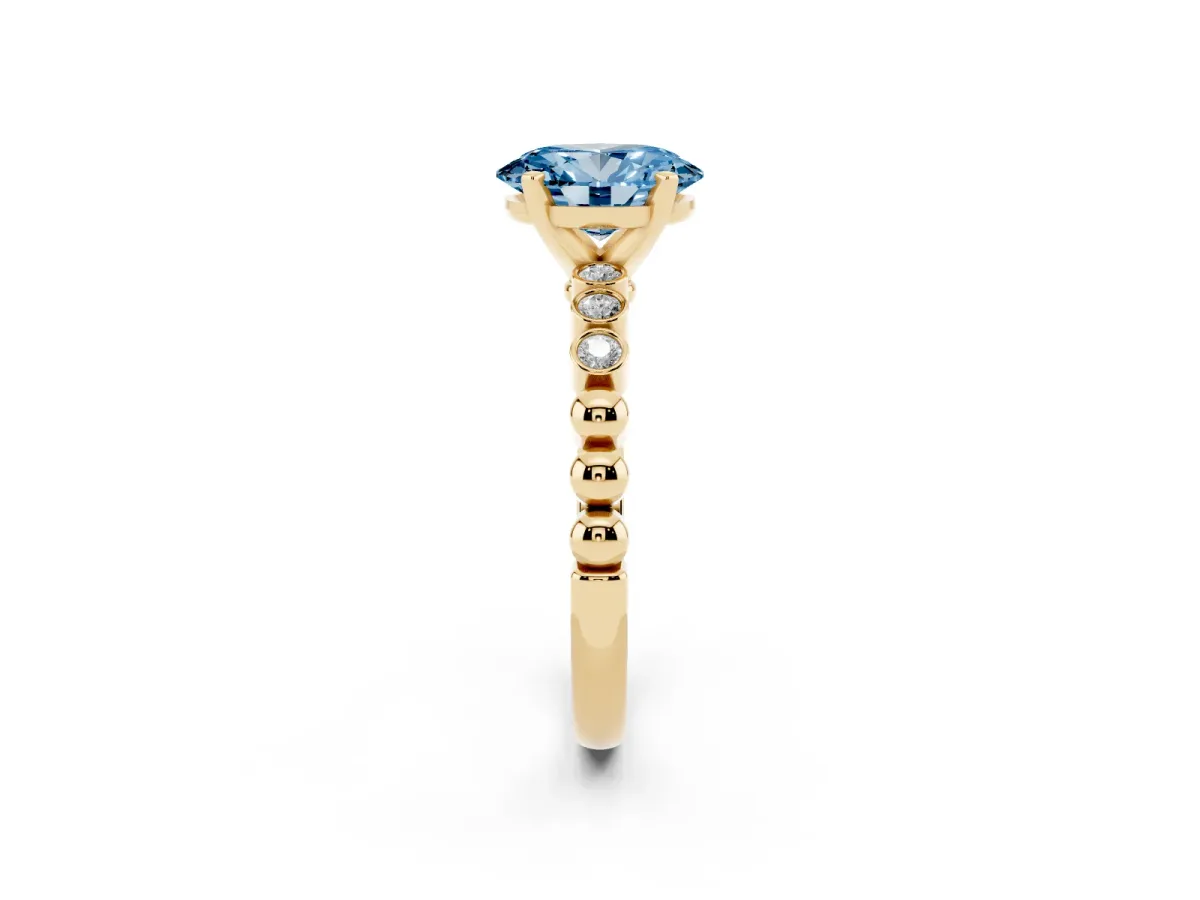 Fancy Blue Oval Cut Solitaire Bezel Accent Diamond Engagement Ring with Beaded Band and Four-Prong Setting Yellow gold