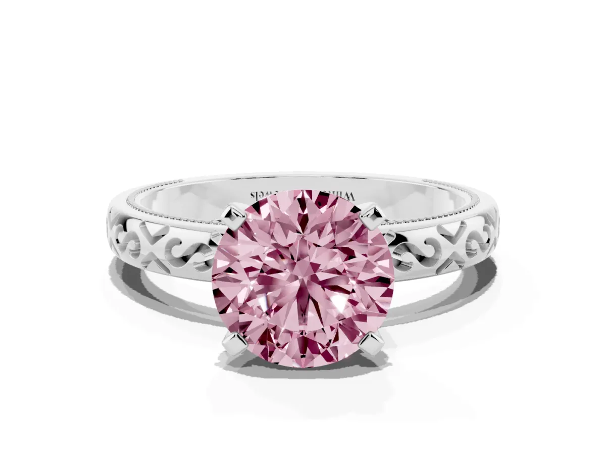 Fancy Pink Round Cut Solitaire Engagement Ring with Scrollwork Band and Four-Prong Setting Silver