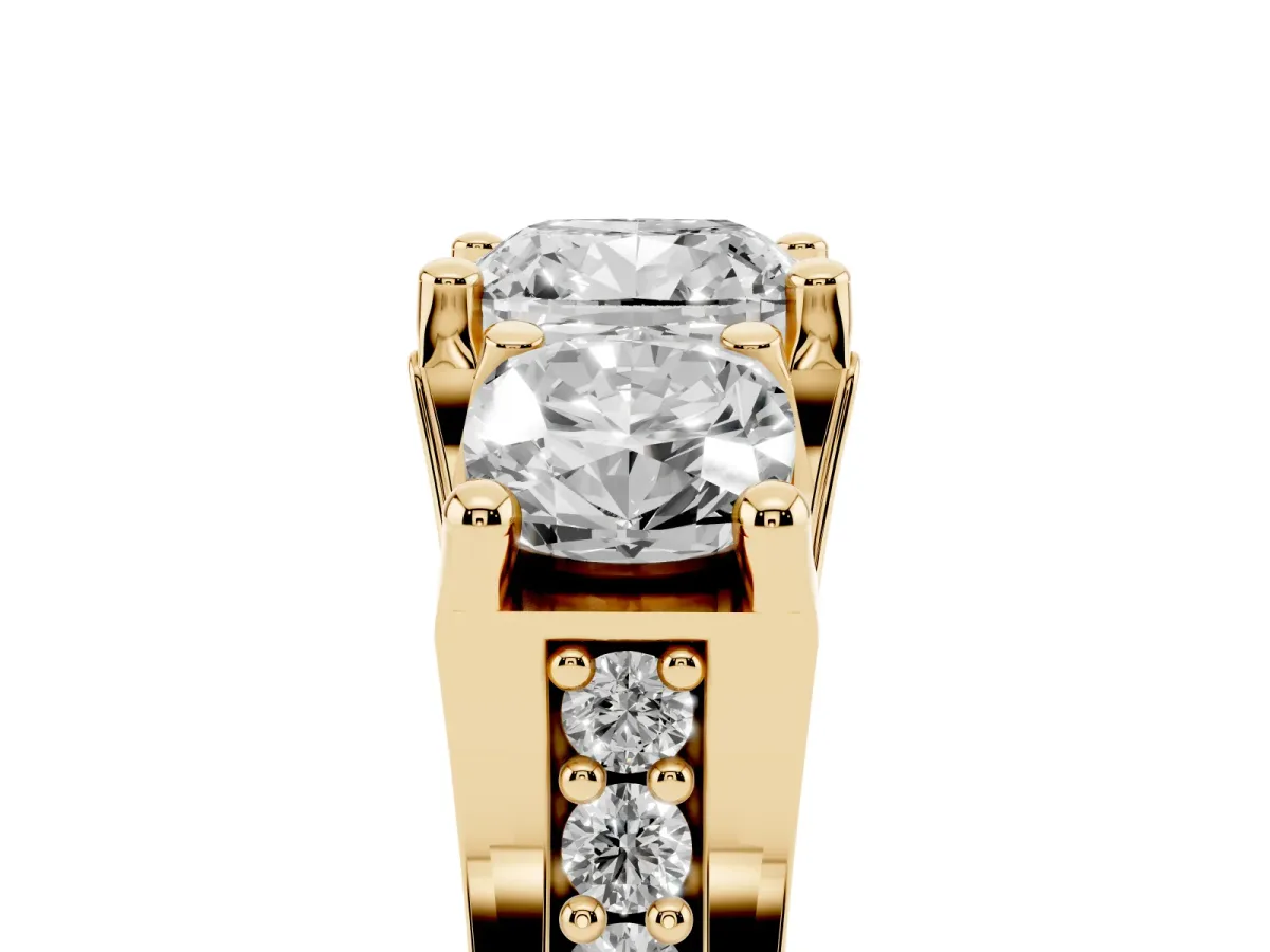 Cushion Cut Diamond Three-Stone Ring with Channel Set Band and Four-Prong Setting Yellow gold