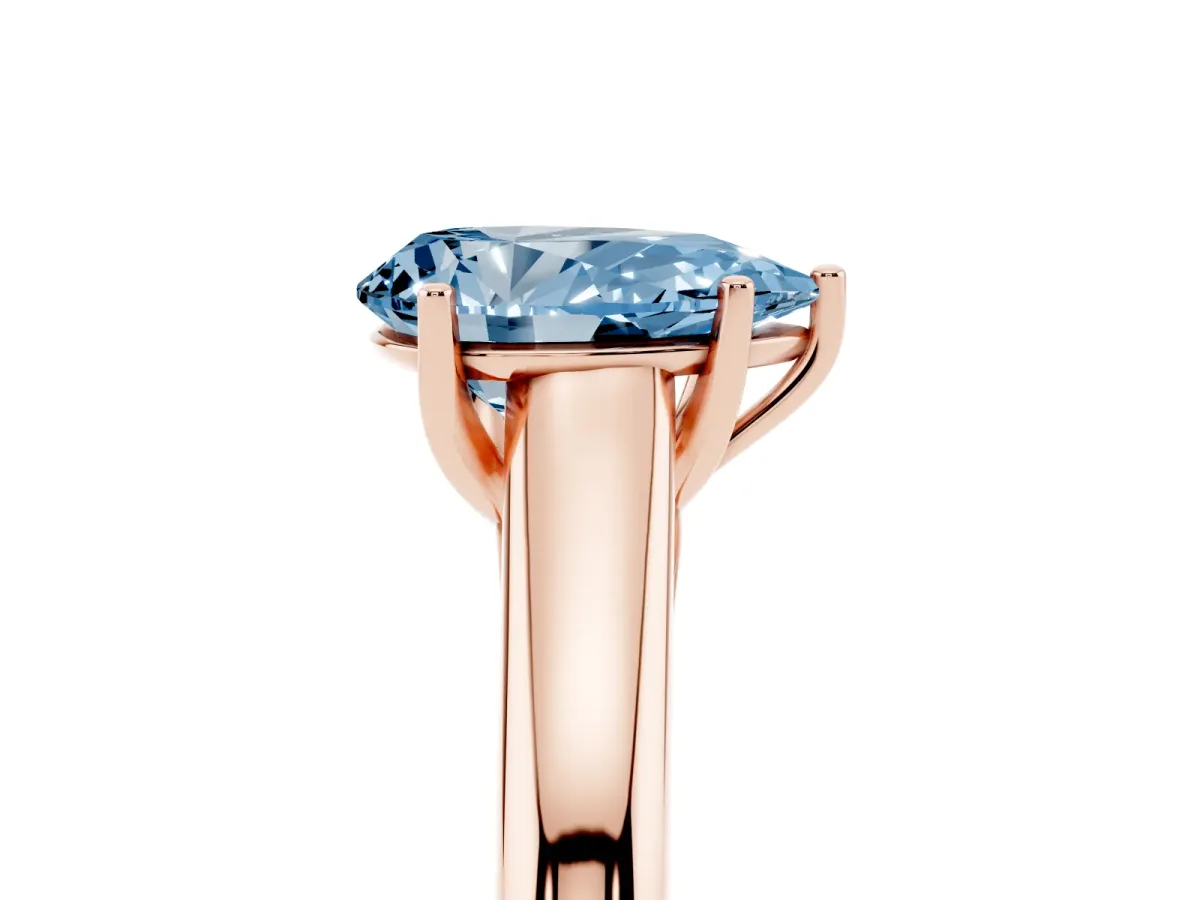 Fancy Blue Pear Cut Solitaire Engagement Ring with Tapered Band and Four-Prong Setting Rose gold