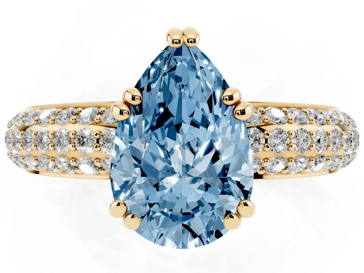 Fancy Blue Pear Cut Diamond Solitaire Ring with Multi-Row Round Pavé Band and Prong Setting Yellow gold