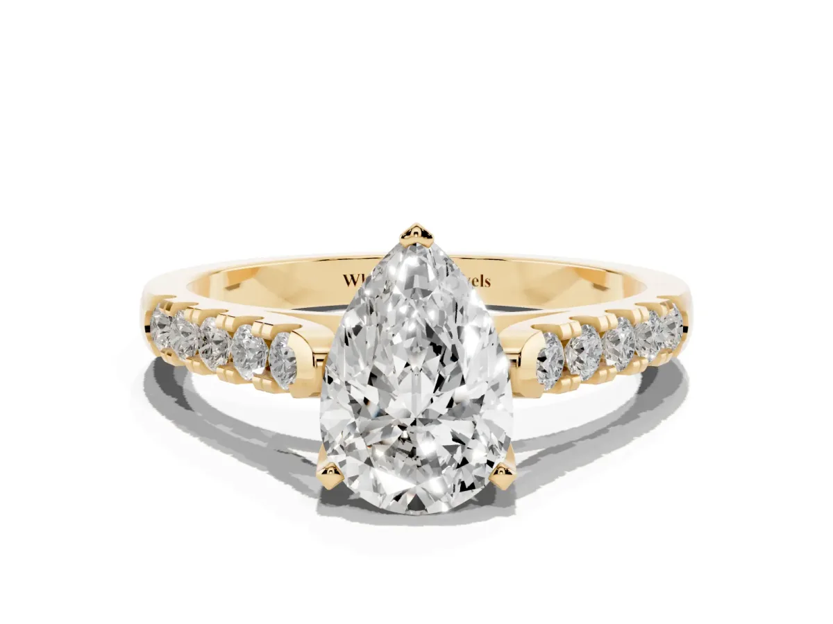 Pear Cut Diamond Pavé Band Solitaire Ring with Prong Setting Yellow gold