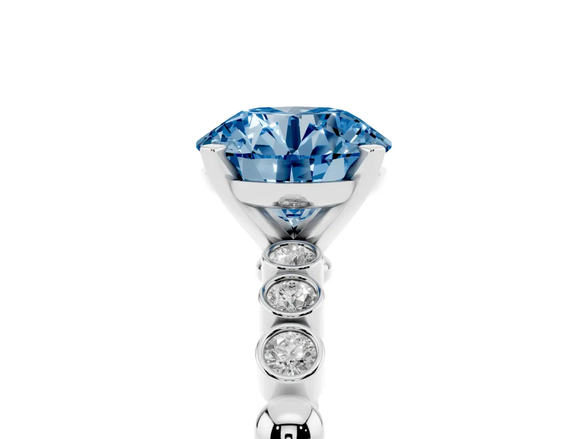 Fancy Blue Round Cut Solitaire Bezel Accent Diamond Engagement Ring with Beaded Band and Four-Prong Setting Silver