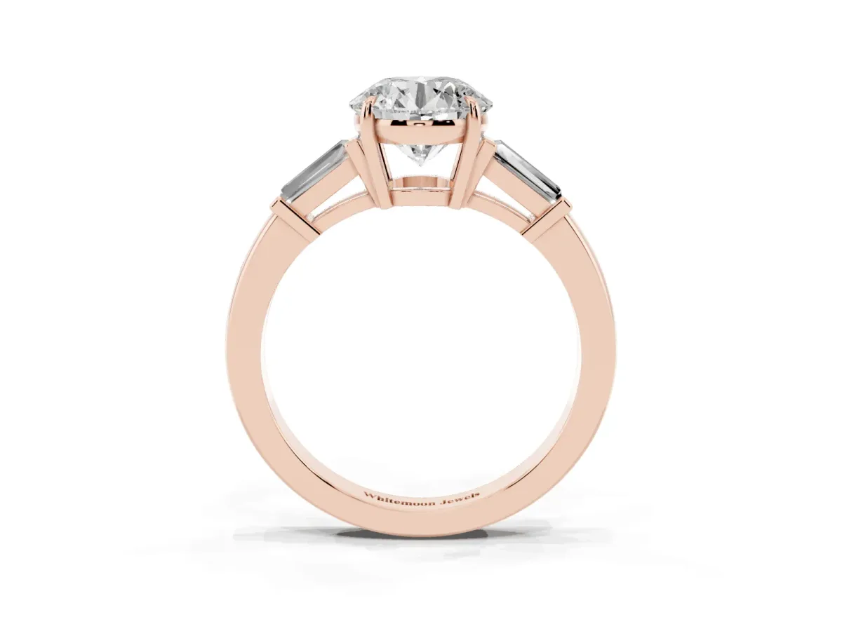 Round Cut Diamond Three-Stone Ring with Tapered Baguette Side Stones and Prong Setting Rose gold