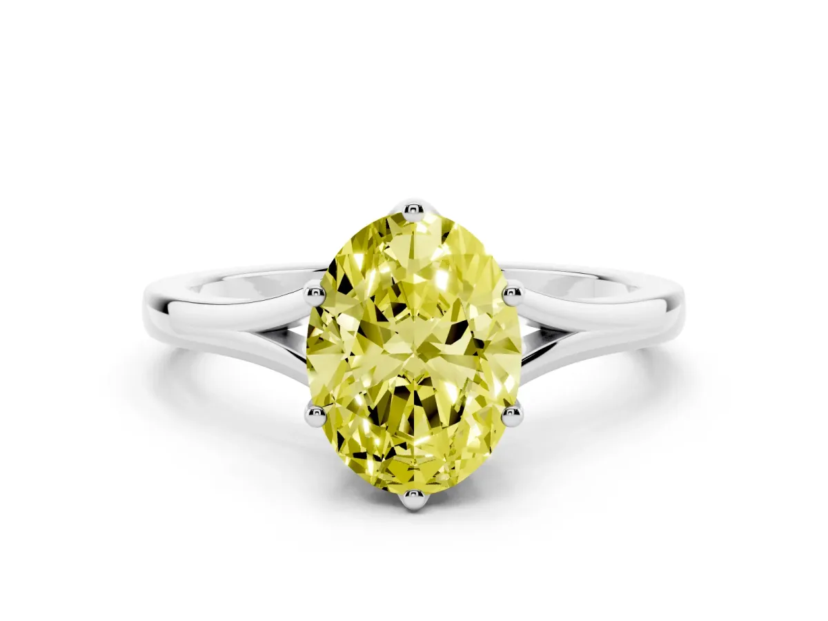 Fancy Yellow Oval Cut Solitaire Diamond Ring with Six-Prong Setting and Tapered Band Silver