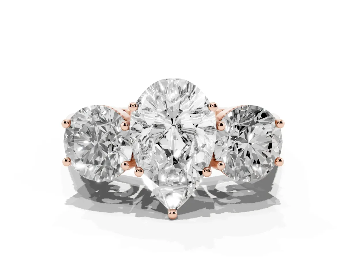 Three-Stone Pear Cut Diamond Engagement Ring with Prong Setting on a Classic Band Rose gold