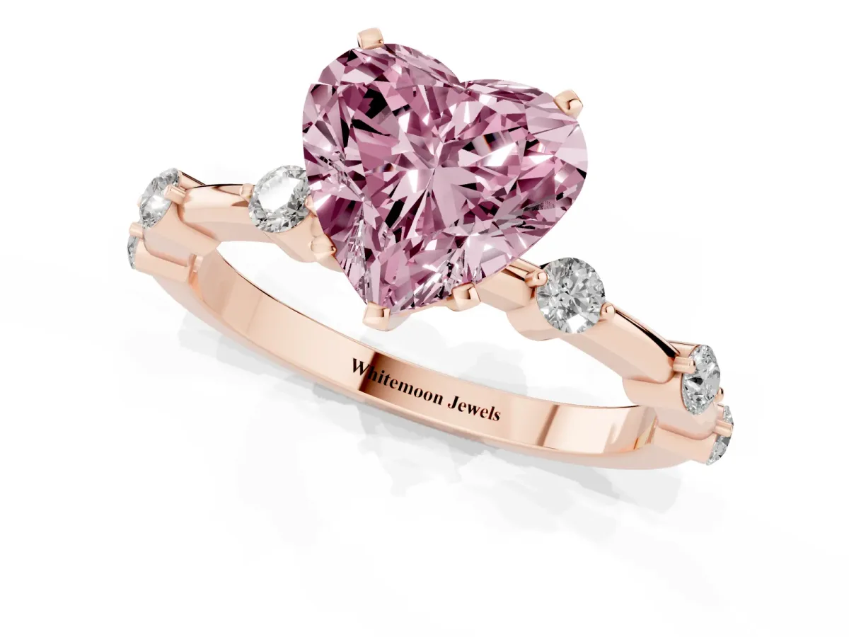 Fancy Pink Heart Cut Solitaire Diamond Ring with Bezel Set Side Stones and Prong Setting Rose gold