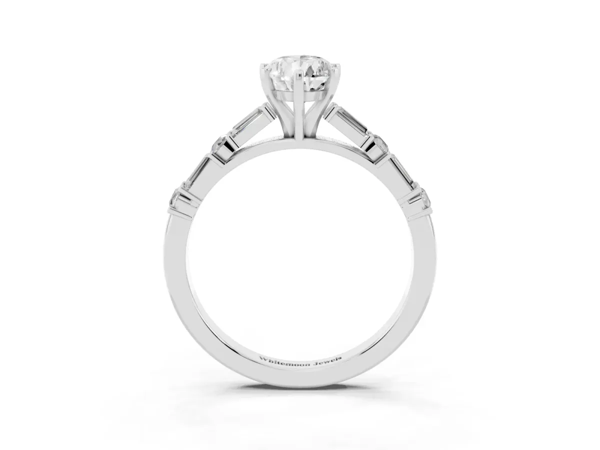 Pear Cut Diamond Solitaire with Side Baguettes and Channel Set Band Platinum