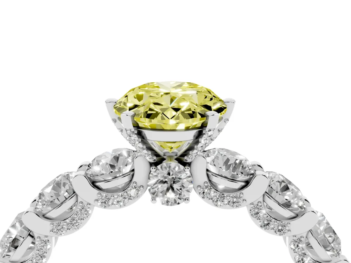 Fancy Yellow Oval Cut Diamond Side Stone Engagement Ring with Four-Prong Setting Platinum