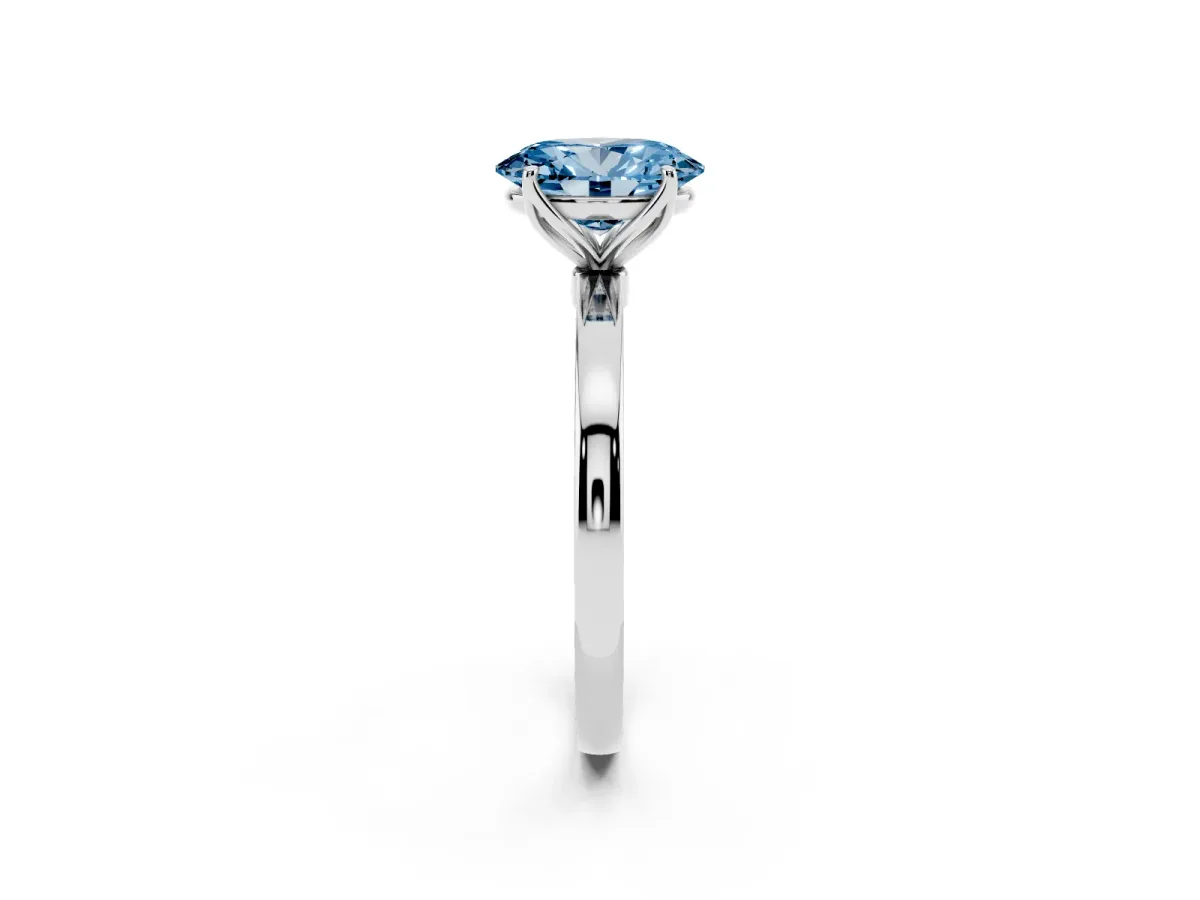 Fancy Blue Oval Cut Diamond Solitaire Ring with Thin Band and Prong Setting Silver