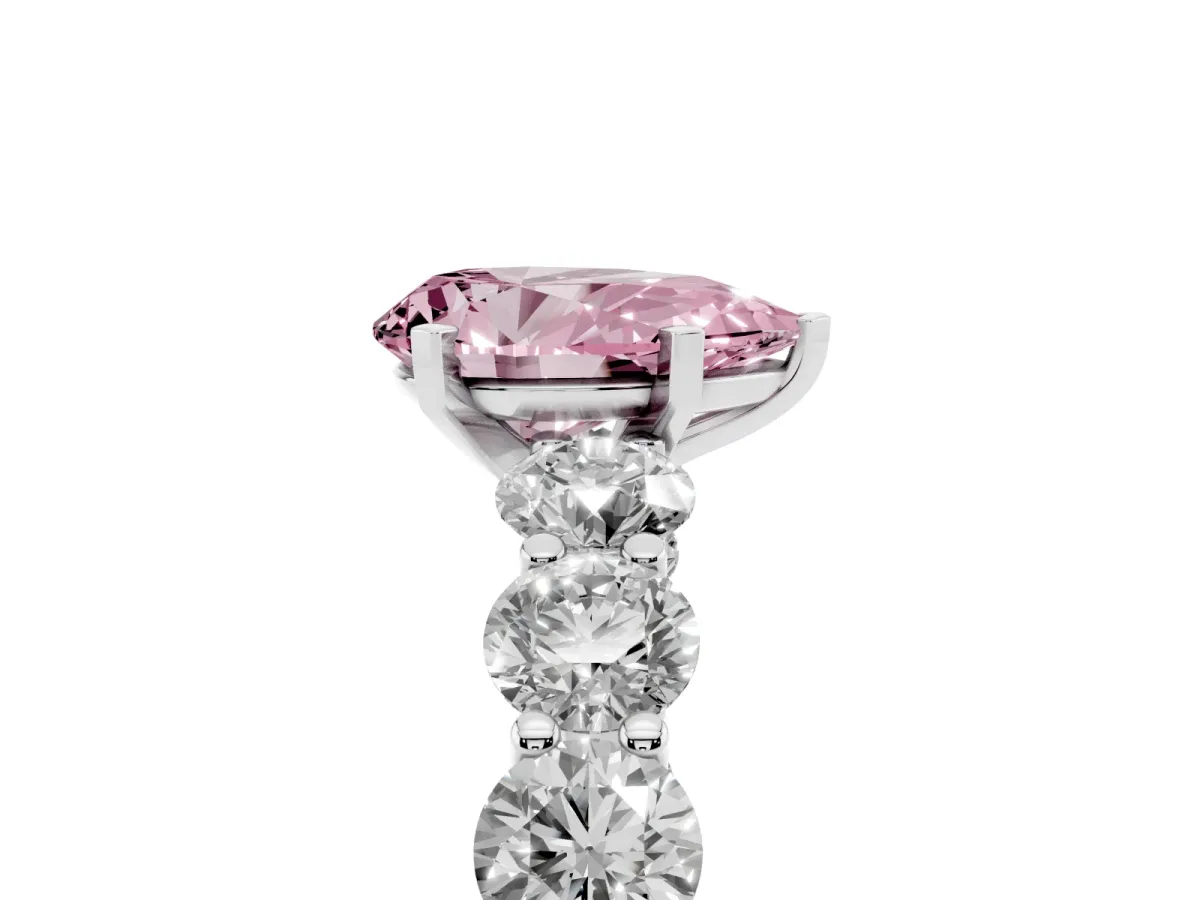 Fancy Pink Pear Cut Diamond Prong Setting with Side Stones on a Pave Band Silver