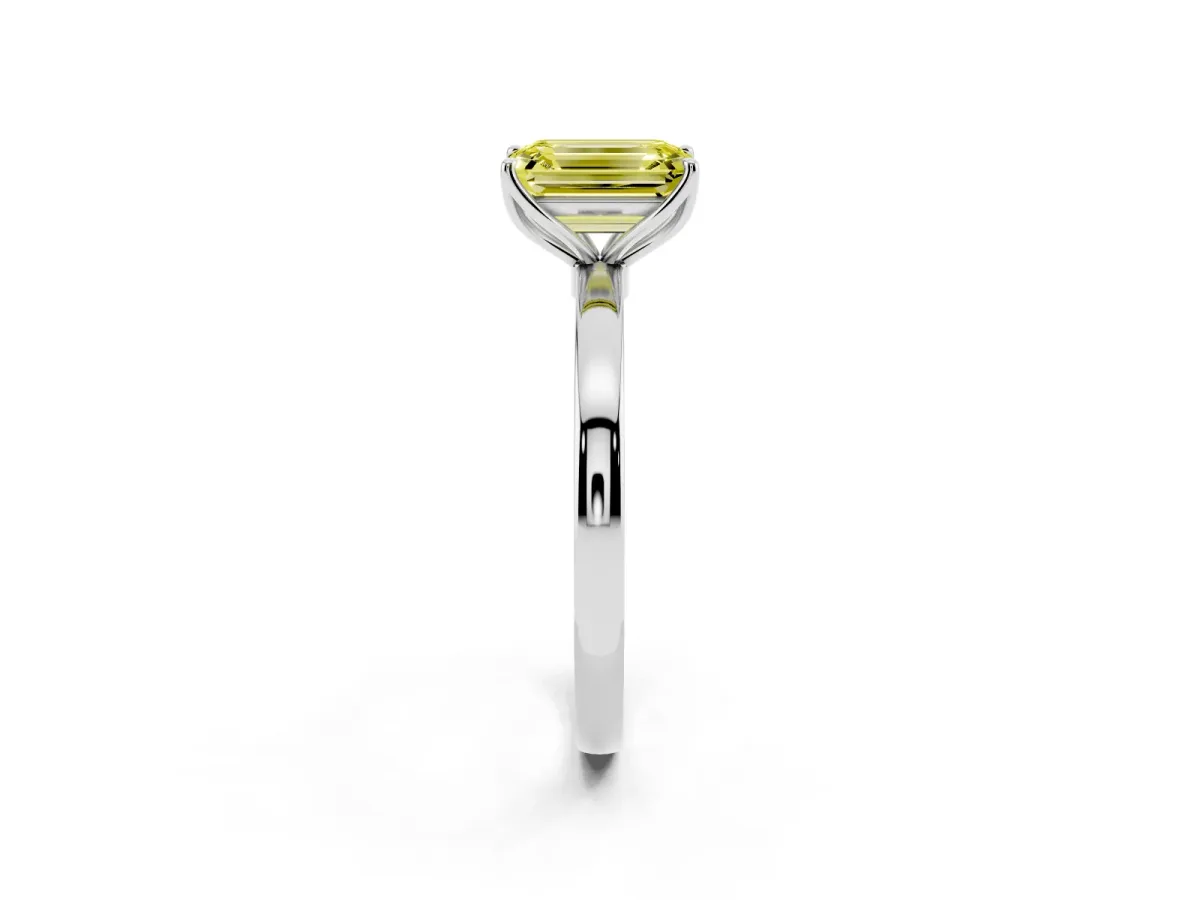 Fancy Yellow Emerald Cut Diamond Solitaire Ring with Thin Band and Prong Setting Silver