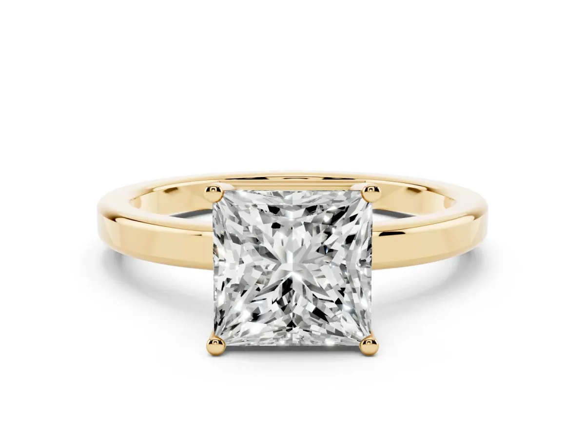 Princess Cut Cut Solitaire Engagement Ring with Four-Prong Setting on a Classic Band Yellow gold