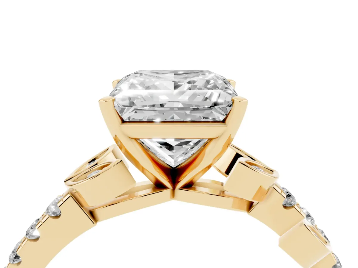 Princess Cut Solitaire Leaf-Inspired Diamond Ring with Pavé Band and Four-Prong Setting Yellow gold