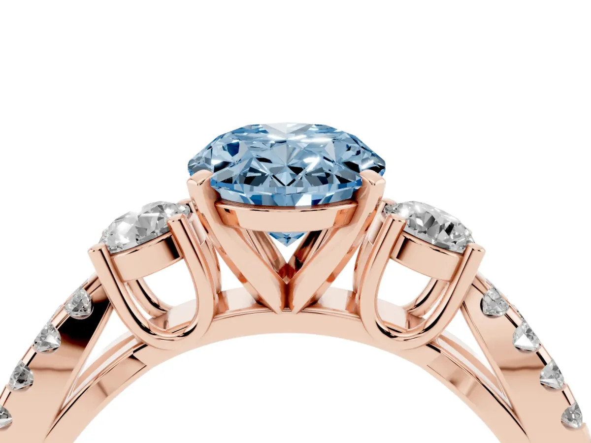 Fancy Blue Oval Cut Diamond Three-Stone Ring with Pavé Split Shank and Four-Prong Setting Rose gold