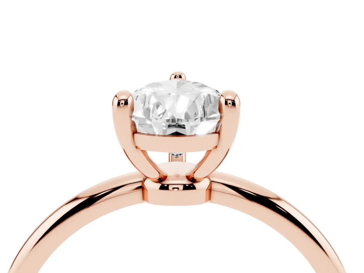 Pear Cut Solitaire Diamond Ring with 4-Prong Setting on a Classic Band Rose gold