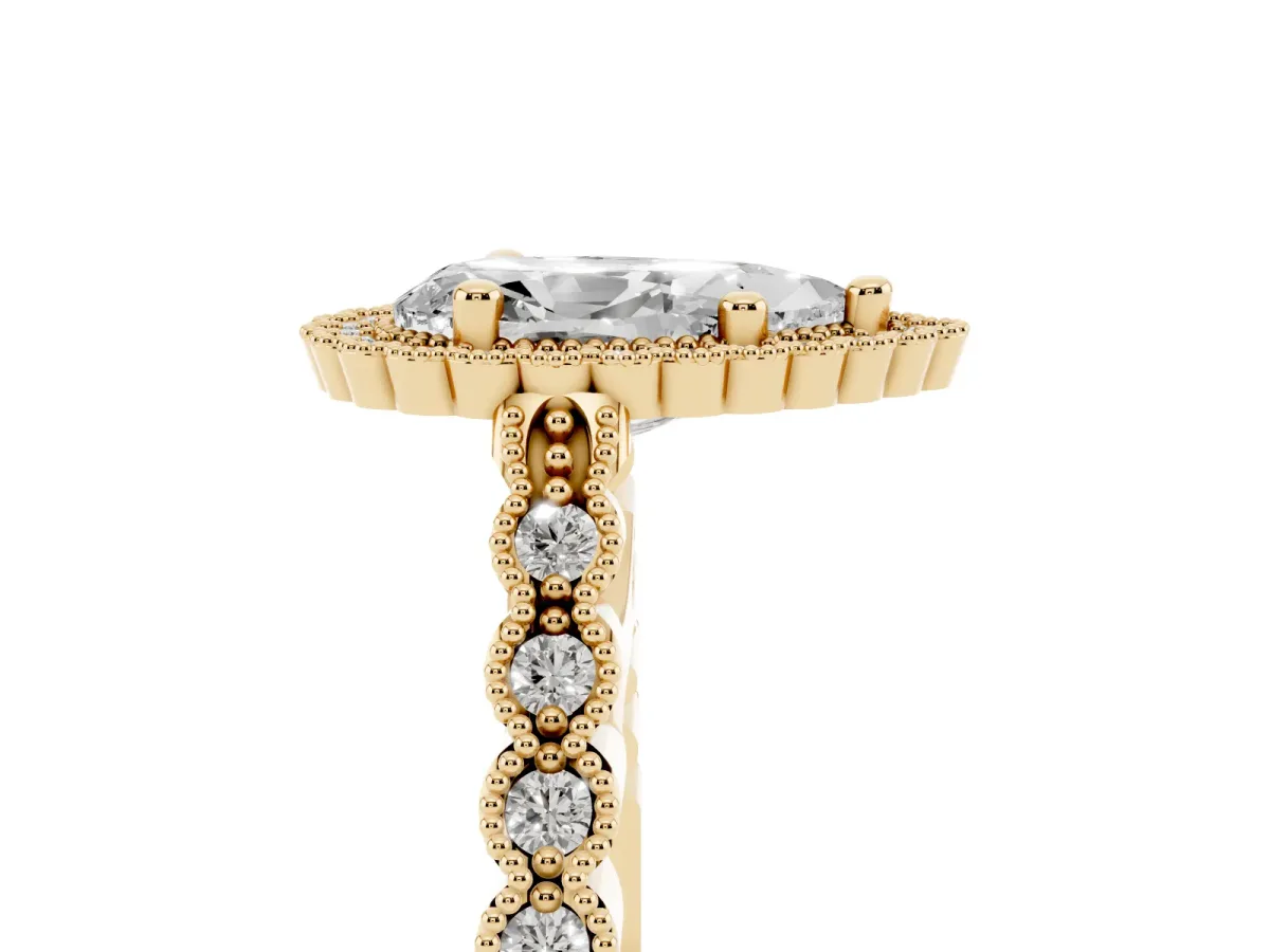 Pear Cut Cut Halo Pavé Solitaire Ring with Milgrain Band Yellow gold