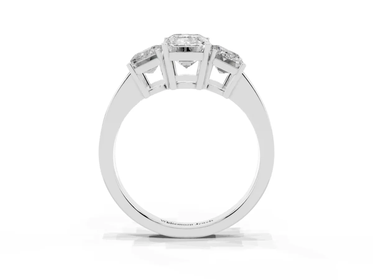 Three-Stone Emerald Cut Cut Diamond Engagement Ring with Flat Band and Four-Prong Setting Platinum