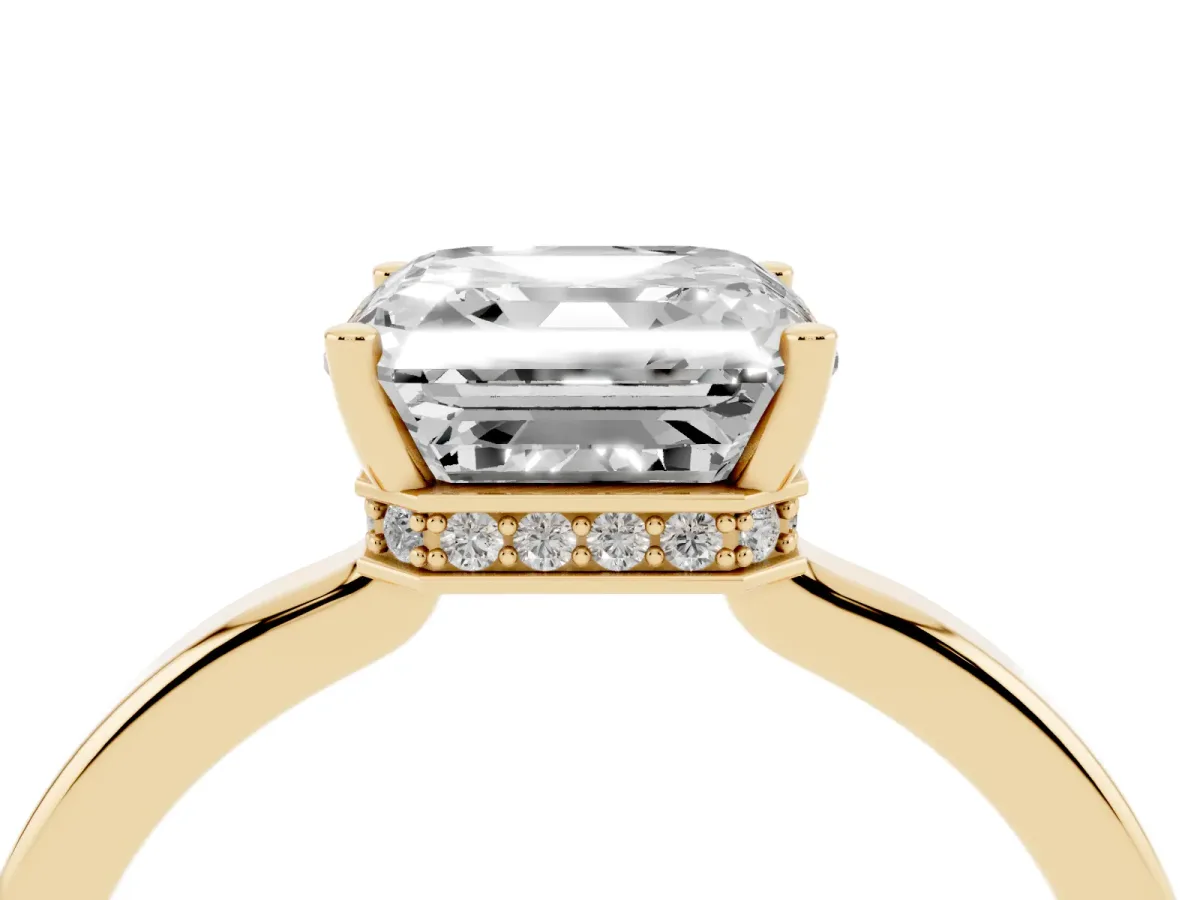 Asscher Cut Cut Solitaire Engagement Ring with Four-Prong Setting on a Classic Band Yellow gold
