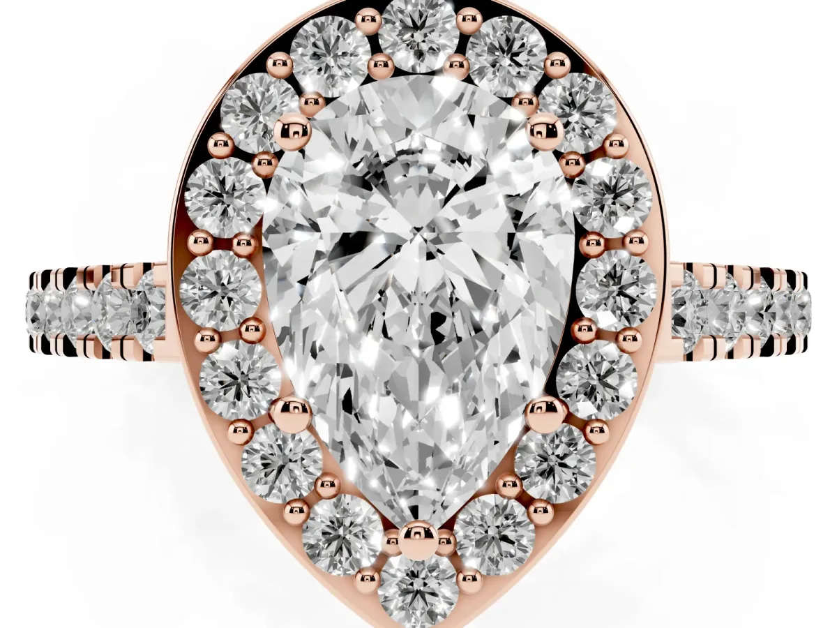 Pear Cut Diamond Halo Ring with Round Pavé Split Shank and Prong Setting Rose gold