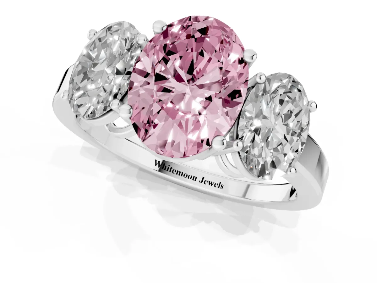 Fancy Pink Three-Stone Oval Cut Cut Diamond Engagement Ring with Flat Band and Four-Prong Setting Silver