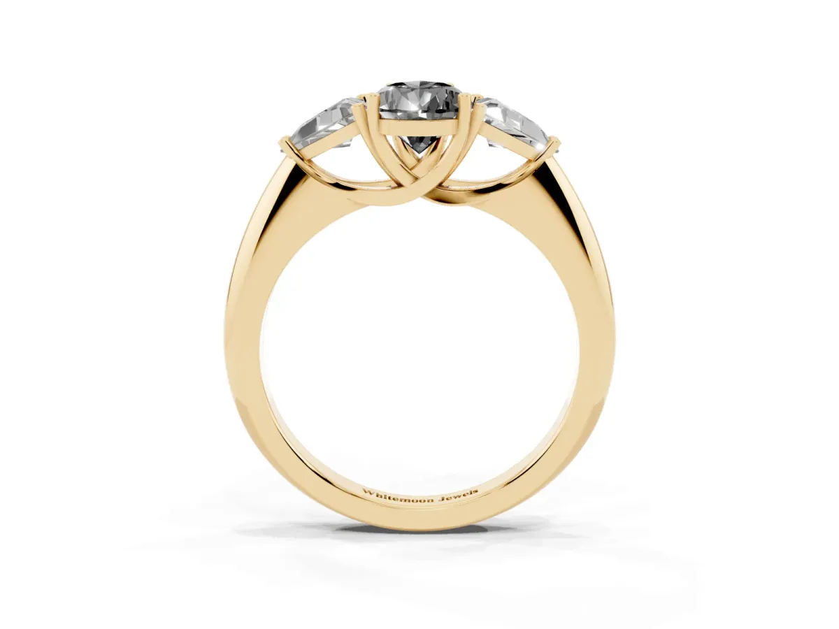 Fancy Black Three-Stone Pear Cut Diamond Engagement Ring with Trillion Side Stones and Prong Setting Yellow gold