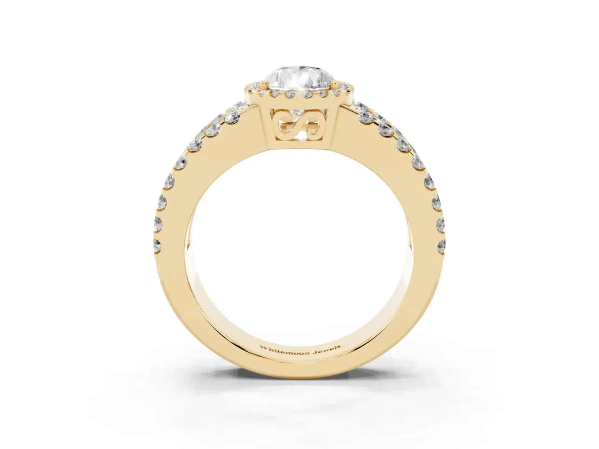 Pear Cut Cut Halo Split Shank Diamond Ring with Four-Prong Setting Yellow gold