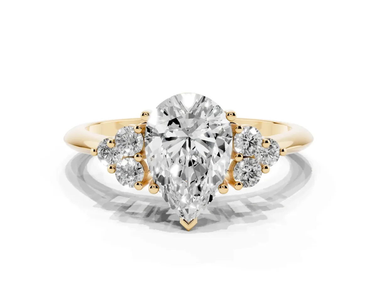 Pear Cut Cut Diamond Cluster Ring with Solitaire Band and Four-Prong Setting Yellow gold