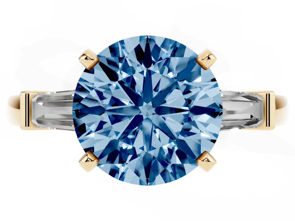 Fancy Blue Round Cut Cut Diamond Solitaire Ring with Tapered Baguette Accents and Four-Prong Setting Yellow gold