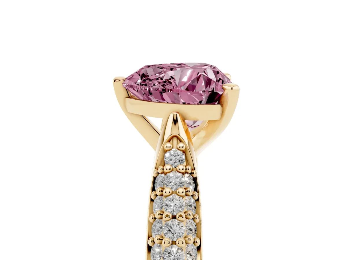 Fancy Pink Heart Cut Diamond Solitaire Engagement Ring with Multi-Row Round Pavé Band and Prong Setting Yellow gold