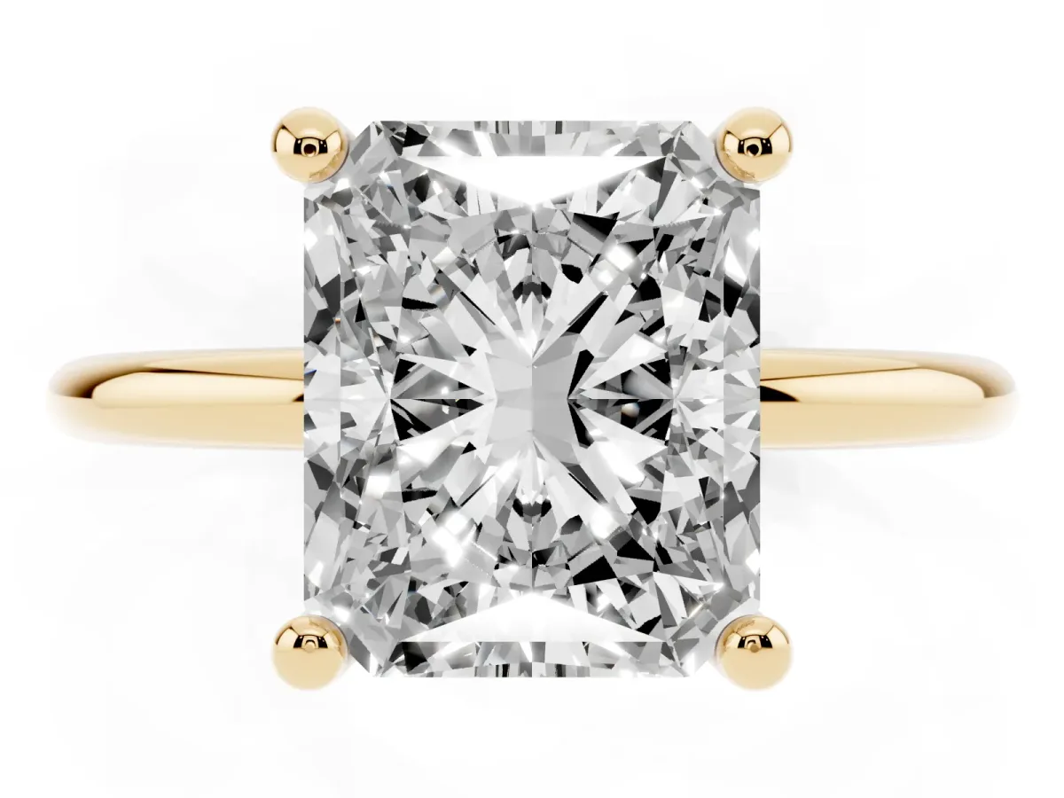 Radiant Cut Solitaire Diamond Ring with 4-Prong Setting on a Classic Band Yellow gold