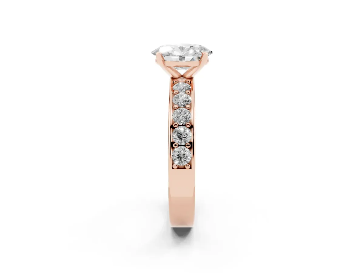 Oval Cut Diamond Engagement Ring with Channel Set Round Band and Prong Setting Rose gold