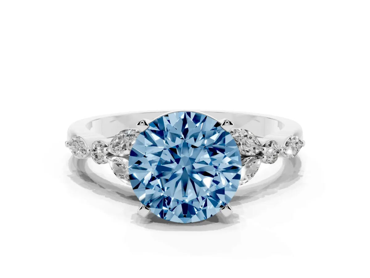 Fancy Blue Round Cut Diamond Solitaire Ring with Side Stones and Four-Prong Setting White gold