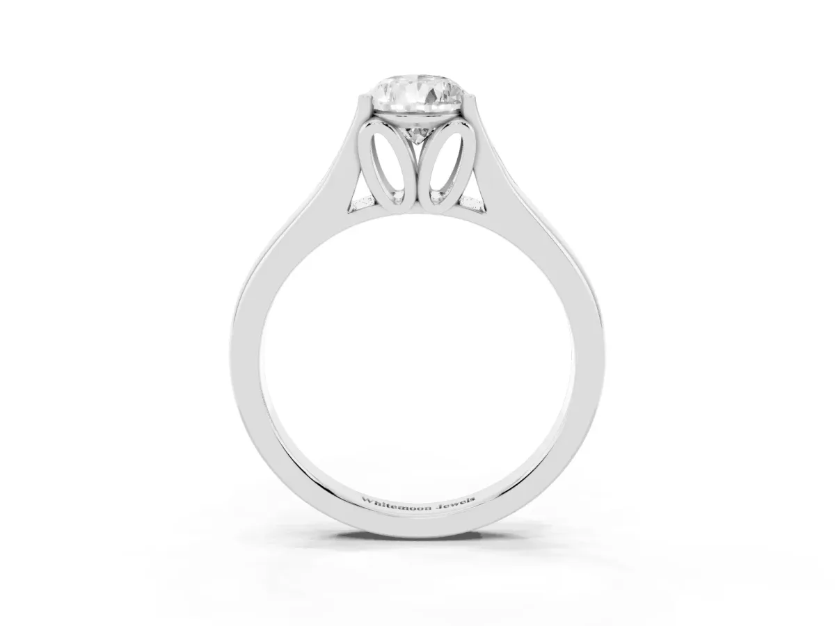 Pear Cut Solitaire Diamond Ring with Cathedral Band and Four-Prong Setting Platinum
