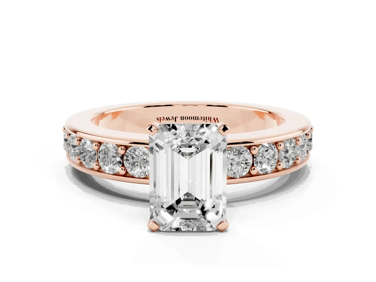 Emerald Cut Diamond Engagement Ring with Channel Set Round Band and Prong Setting Rose gold