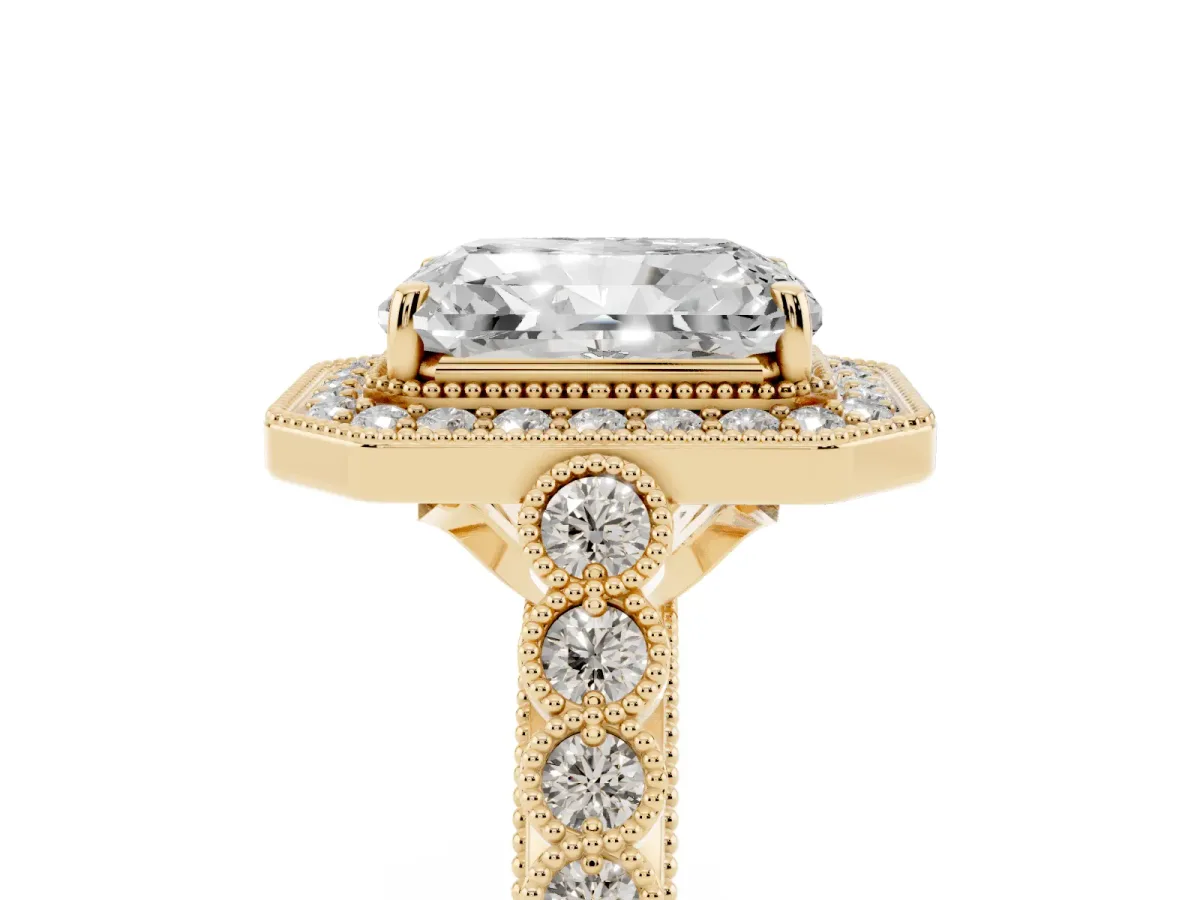 Radiant Cut Halo Milgrain Solitaire with Bezel Set Side Stones and Pave Band Yellow gold