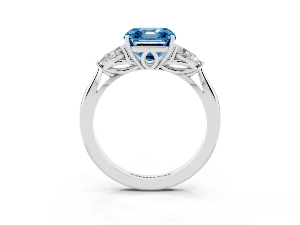 Fancy Blue Three-Stone Asscher Cut Diamond Ring with Pear Side Stones in Four-Prong Setting Silver