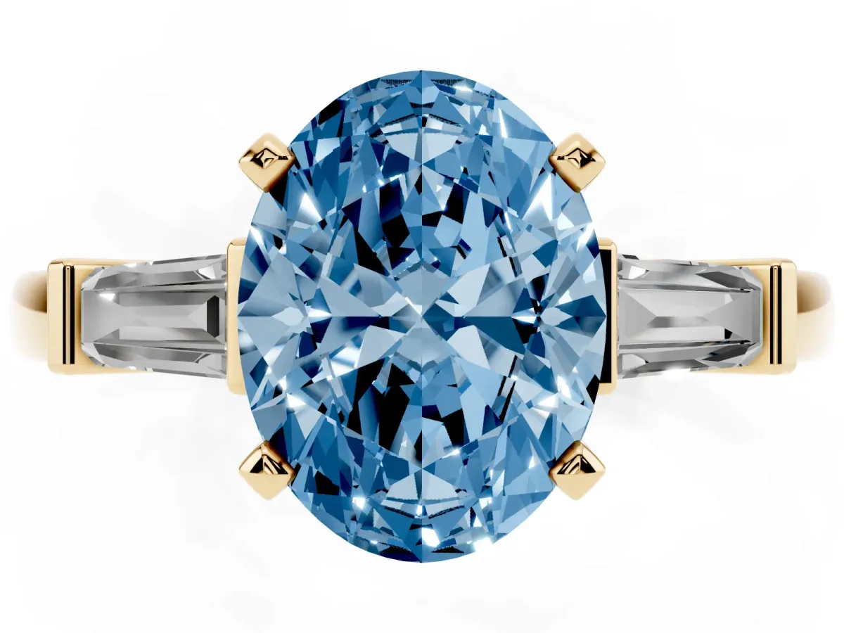 Fancy Blue Oval Cut Cut Diamond Solitaire Ring with Tapered Baguette Accents and Four-Prong Setting Yellow gold