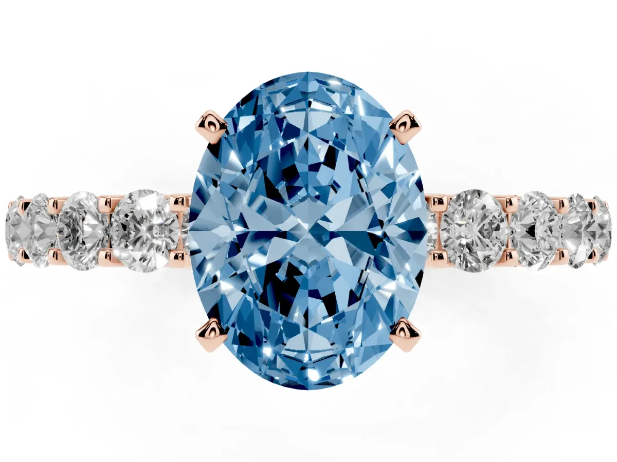 Fancy Blue Oval Cut Diamond Solitaire Ring with Shared Prong Pavé Band and Four-Prong Setting Rose gold