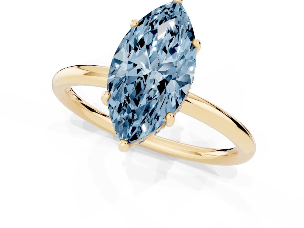 Fancy Blue Marquise Cut Solitaire Diamond Ring with a Classic Band and Four-Prong Setting Yellow gold