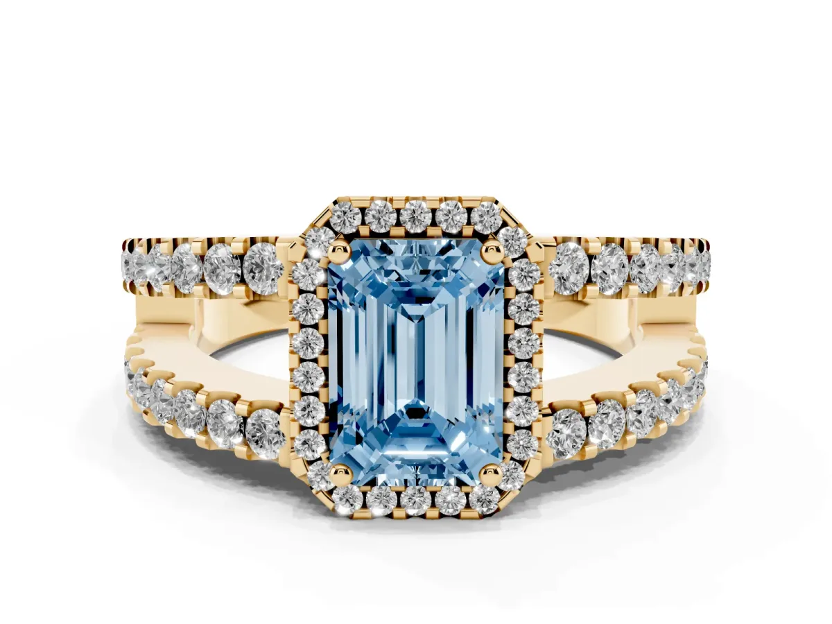 Fancy Blue Emerald Cut Cut Halo Split Shank Diamond Ring with Four-Prong Setting Yellow gold