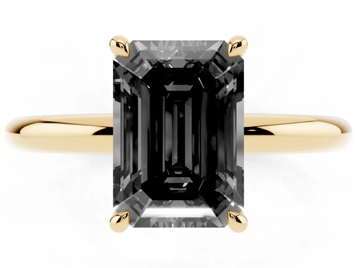 Fancy Black Emerald Cut Diamond Solitaire Ring with Thin Band and Four-Prong Setting Yellow gold